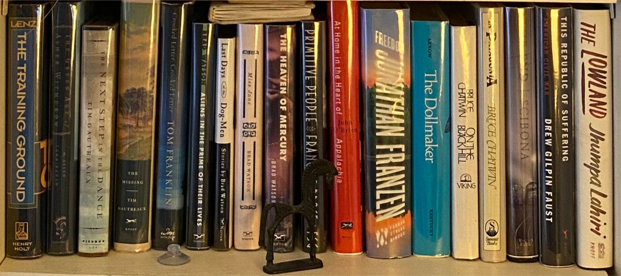 Photo of shelf C4 in the Right bookcase at Pleasant Street (fourth shelf from top)
